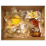 Box of misc. faucet stems, etc.