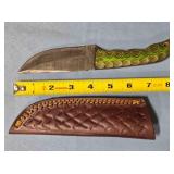 Straight blade knife w/spine jimping.