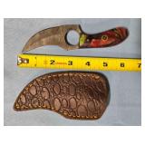 Trailing point knife w/jimping on handle.