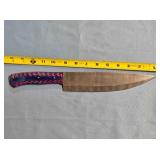 Drop point blade knife. Carved wood handle.