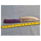 Drop point blade knife. Carved wood handle.