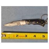 Lockback knife w/keychain. Wood handle.