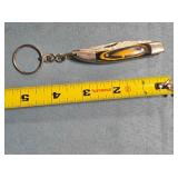 Small folding knife w/key chain.