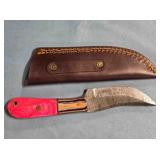 Trailing point knife. 8" length. Damascus steel.