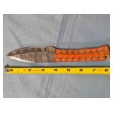 Drop point knife w/jimping on spine.