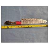 Drop point blade knife. Two tone wood handle.