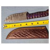 Straight blade knife w/spine jimping.