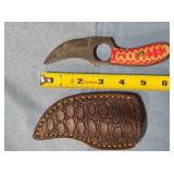 Trailing point blade knife w/finger hole in blade