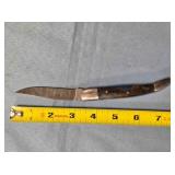 Folding pocket knife w/composite handle.
