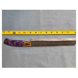 Serrated bread knife. composite/wood handle.