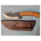 Trailing point knife w/gut hook. Damascus steel