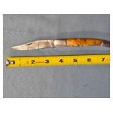 Folding knife w/composite handle. Damascus steel.