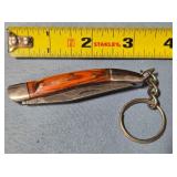 Small folding knife w/key chain.