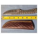 Straight blade knife w/jimping on spine.