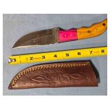 Straight blade knife w/jimping on spine.