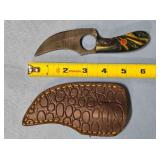 Trailing point knife w/spine jimping.