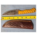 Drop point blade knife w/spine jimping.