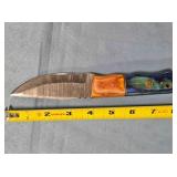 Bowie-style knife w/jimping on spine.