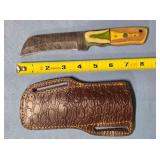Hawksbill blade knife w/jimping on spine.