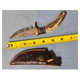 Bowie-style knife w/jimping on spine & guard.