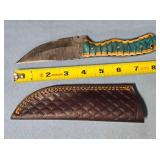 Straight blade knife w/spine jimping.