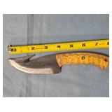 Trailing point hunting knife w/gut hook.