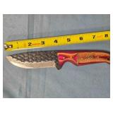 Drop point hunting knife w/wood handle.