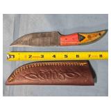 Straight point knife w/jimping on spine.