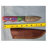 Drop point blade knife w/jimping on spine.