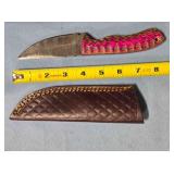 Straight point blade knife w/jimping on spine.