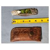 Trailing point lockback knife. Jimping on spine.