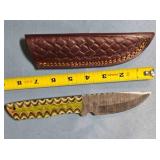 Straight blade knife w/jimping on spine.