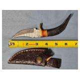 Trailing point knife w/jimping on spine.