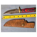 Bowie-style knife w/jimping on spine & guard.