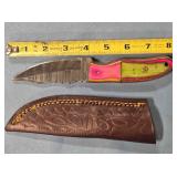 Trailing point knife w/jimping on blade.