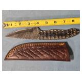 Drop point knife w/light jimping. 8" length.