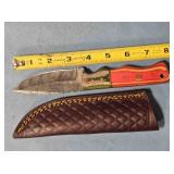 Drop point knife w/light jimping. 8" length.