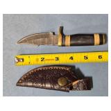 Trailing point knife w/spine jimping.