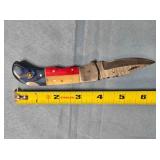 Lockback folding knife w/Bowie-style blade.