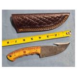 Trailing point hunting knife w/gut hook.