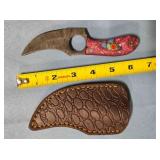 Trailing point knife w/jimping on spine.