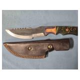 Serrated straight blade knife. 10" length.