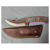 Trailing point knife w/gut hook. Damascus steel