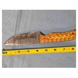 Drop point knife  w/jimping on spine.