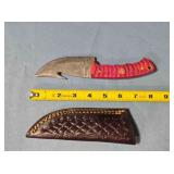 Trailing point knife w/gut hook.