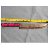 Straight blade 13" knife. Carved wood handle.