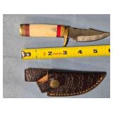 Trailing point blade w/spine jimping.