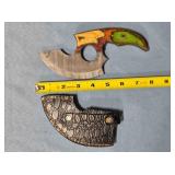 Ulu-style knife w/finger hole in blade.