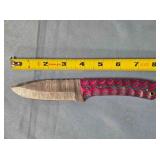 Drop point knife w/jimping on spine.