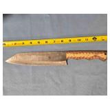 Drop point kitchen knife w/carved wood handle.